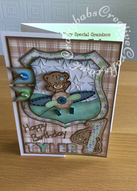 1st Birthday Card for a little boy, made using Trimcraft's Tiny Tatty Teddy 3d dies and matching 12"x12" papers. Also using Marianne sentiment dies and Sizzix sizzlits Fruit Smoothie alphabet dies - craftybabscreativecrafts.co.uk