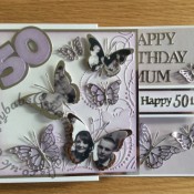 Double Z fold 50th birthday card using various dies including; Memory box Leavenworth and cascadia butterflies, Tatteref Lace sentiment dies, Sizzix originals Shadow box number dies and Darice butterflies embossing folder - craftybabscreativecrafts.co.uk