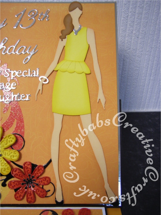 13th Birthday Fashion Easel card made using various die including; Quickutz Cookie Cutter Fashion Doll dies, Tattered Lace Lacey Daisies dies, Memory Box Gwyneth flourish die, Tattered lace sentiment dies (snipped to form new words), Britannia dies large Happy Birthday sentiment, Cheery Lynn Delicate Lace Script dies for numbers. - craftybabscreativecrafts.co.uk