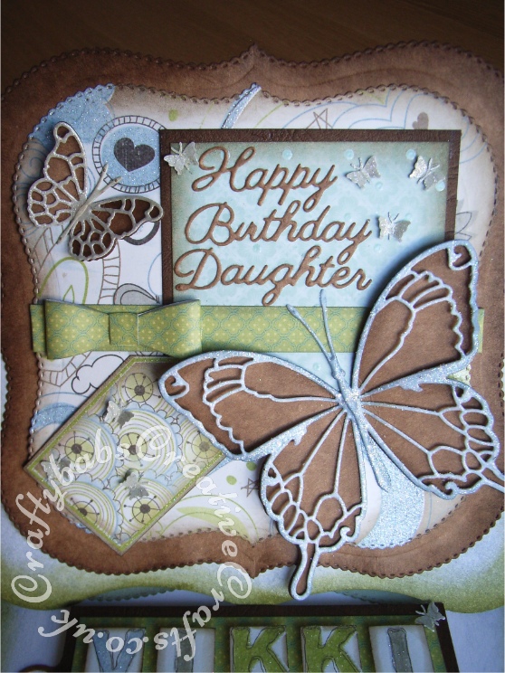 Large Butterfly Easel birthday card made using various dies including; Memory box Tristan, Chloe, Pippi and Isabella dies, My Favourite things Dainty bows dies, Britannia dies Happy Birthday Daughter sentiments dies, Cheery Lynn reflections boutique pearl french flair dies and flourishes from the Marianne scalloped circle frame die set. - craftybabscreativecrafts.co.uk