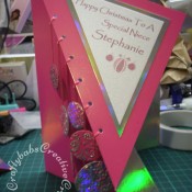 Diagonal Foldback Dangling Baubles Christmas card made using Cuttlebug 3x3 cut and emboss snow fun die set. - craftybabscreativecrafts.co.uk