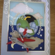 Kinetic Graduation Card made using; Xcut Build a scene All aboard round the world dies, Birtannia dies congratulations sentiment, custom made graduation teddy die for mortar board and scroll. Martha Stewart edge punch zig zag used for insert. - craftybabscreativecrafts.co.uk