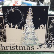 Scenic Stepper Christmas card made using Memory Box Grand merry Christmas die, Memory Box country landscape die, Memory Box snowy breeze border die, Memory Box Frostyville border die, Dee's Distinctively Christmas tree overlay #1 die and Dee's Distinctively Christmas tree stacker die - craftybabscreativecrafts.co.uk