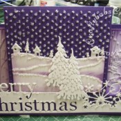 Scenic Stepper Christmas card made using Memory Box Grand merry Christmas die, Memory Box country landscape die, Memory Box Frostyville border die, Dee's distinctively Snow covered Tree (small) die, and cuttlebug Winter borders embossing folder - craftybabscreativecrafts.co.uk