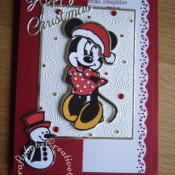 Minnie Mouse Christmas card made using Cuttlebug Disney Minnie Mouse Cut & Emboss die, Cuttlebug Disney Santa's List Cut & Emboss die, Britannia dies Happy Christmas sentiment die and Dovecraft Me To You Winter wonderland embossing folder - craftybabscreativecrafts.co.uk