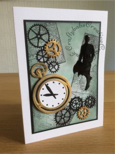 Male card made using inspiration from ideas featured in Simply Cards & Papercraft issue 159 using X Cut Chronology Pocket watch and cogs die sets (with gilding wax applied) and Memory Box Gear works border die. Silhouette stamped using Personal Impressions Mens Silhouette stamps and enhanced with Anita's 3D gloss. Backgound inked with disress inks and stamped with old map stamps. - craftybabscreativecrafts.co.uk