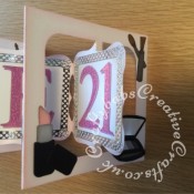 Accordion flip 21st Birthday card made using Sizzix Bigz accordion flip 3d die, frames cut with Tattered Lace Chatsworth square die, Lettering cut with Quickutz Mary Jane cookie cutter alphabet dies. Make up items cut using various dies icluding Quickutz cookie cutters from the 'Flirt' set, Ellison thin cut eye make up die, Sizzix sizzlits Glam girl set, Quickuts 2 x 2 Eye Make up and lipstick dies. Sentiments cut using Tattered lace sentiment dies and Britannia sentiment dies - craftybabscreativecrafts.co.uk