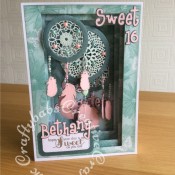 Dream Catcher Panorama Card made using a variety of dies including; Todo collection feather dies, Spellbinders Shapeabilities Dies-Feathers, Sizzix Sizzlits Alphabet 654546 Girls are weird dies, Nesting Circles dies, Nellie Snellen Multi Frame Dies - Straight Dotted Rectangle dies, Tattered Lace Doily Flourish die, Hardwick Scallop Circle (D358) die, Tattered Lace Panorama Large Inner Plates (PAN02) and Tattered Lace Panorama Large Concertina Side (PAN03) - craftybabscreativecrafts.co.uk
