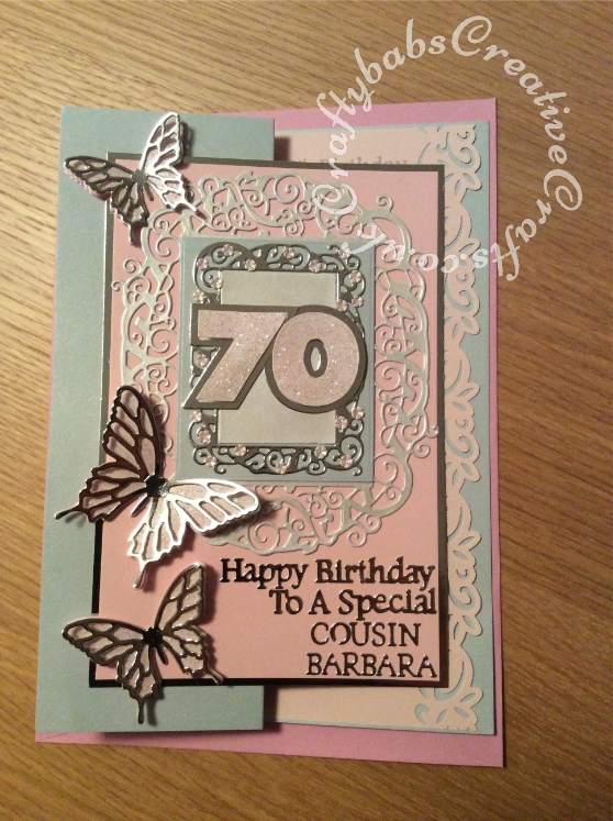 70th Birthday Card made using a variety of dies including; Sizzix Thinlits Intricate Butterfly dies, Sizzix originals Shadow Box Numbers dies, Tattered lace sentiments 2014 dies, Tattered Lace Alphabet Bunting dies for name & relation and Tonic studios Home Together die set- craftybabscreativecrafts.co.uk