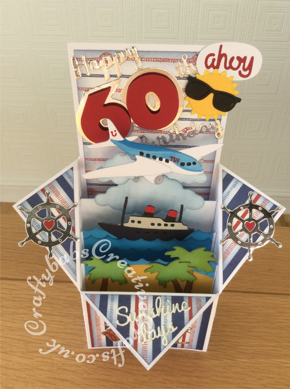 Pop Up Box 60th Birthday Card, Cruise themed, made using various dies including; Sizzix Originals Shadowbox numbers dies, 661229 - Sizzix Thinlits Die Set 7PK - Nautical by My Life Handmade, Xcut Build-A-Scene Dies, Nautical, Xcut Build a Scene Dies All Aboard, Sizzix Thinlits Die Set 15pk-Rainy Days and Sunshine by My Life Handmade, Sentiment dies free with issue 109 of Papercrafter magazine, Crafters companion Gemini Expressions Metal Die - Uppercase and lower case Alphabet Sets. - craftybabscreativecrafts.co.uk