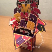 Pop Up Box PHD Graduation card made using a variety of dies including; Sizzix Shadowbox Alphabet dies, Sentiment dies free with issue 109 of Papercrafter magazine, Crafti Potential 'Amazing' sentiment dies, and various Quickutz 2" dies. - craftybabscreativecrafts.co.uk
