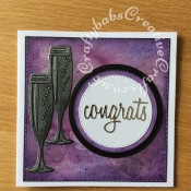 Simple Congratulations card made with inked and mica sprayed background using various dies including Crealies Nest-Lies Double Stitch Circles Nesting Die Set Crea-Nest-Lies XXL 33, Crealies DOUBLE STITCH Die Set No.34 SQUARES dies, Sizzix Tim Holtz script sentiment die and Marianne Design Creatables Champagne Glass Die, - craftybabscreativecrafts.co.uk