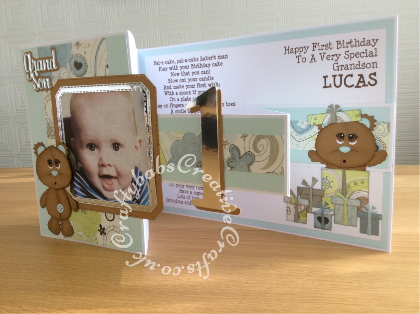 Large A4 Landscape Z fold 1st Birthday card made using Surpise Creation nested stitched Octagon square dies, Sizzix Bigz Sassy Serif Numbers dies, unbranded Bear with parcels die set, unbranded bear die and Paper Boutique Die Set Male Relations Sentiments. - craftybabscreativecrafts.co.uk