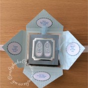 Baby Boy Birth keepsake made using a variety of dies including Marianne Design Cutting and embossing stencils Creatables - My first sneakers, Quickutz nesting Tag dies, Lettering created using Memory box Alphabet soup upper case and lower case alphabet dies, Ellison thick cutz envelope die, Cuttlebug baby elements die, Marianne baby feet dies, Spellbinders nesting plain & scalloped oval dies, Parchment pocket made using an envelope template stencil, baby clothes and baby words embossed using brass stencils, outer cover embossed using Crafter's Companion Basket Weave - Texture 8x8 Embossing Folder. - craftybabscreativecrafts.co.uk