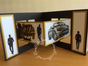 Extra Large masculine car/James Bond themed Accordion card made using various dies including: Crealies Create A-Card Die No.1, Cardmaking Magic by Christina Griffiths Happy Birthday sentiment die, Paper Boutique Die Set Male Relations Sentiments, Sizzix sizzlits Fruit Smoothie alphabet dies, Marianne Design Men's Wardrobe COL1434 dies, and unbranded male silhouette dies. Decoupaged cars produced using La Pashe CDRom. - craftybabscreativecrafts.co.uk