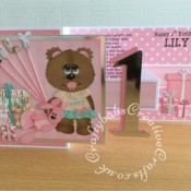 Ist birthday Girl Z Fold card made using various unbranded bear, bear outfit and parcel dies, Alphabet balloons dies from The Works and Sizzix Bigz Sassy Serif Numbers dies and Die Monde custom made wooden bear and bunny die. - craftybabscreativecrafts.co.uk