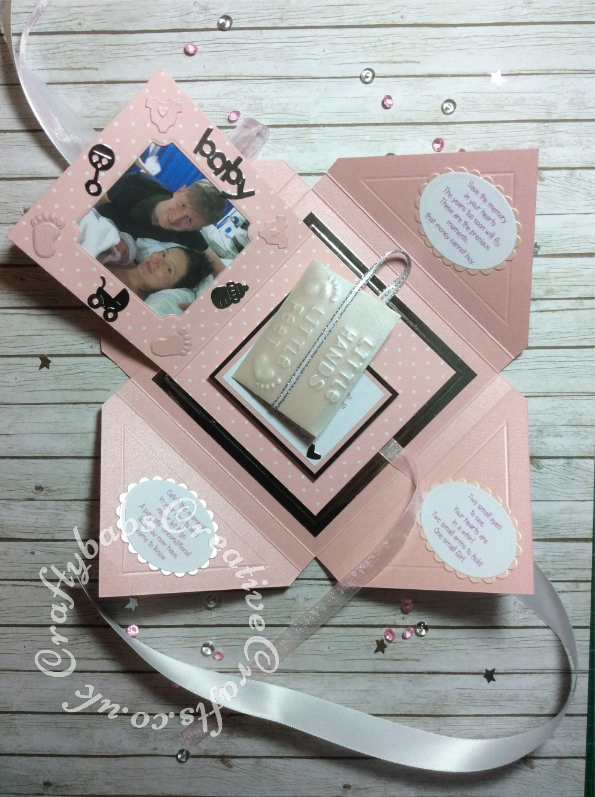 Baby Girl Birth keepsake made using a variety of dies including: Tattered Lace Essentials Die - Notched Squares ETL311, Quickutz nesting Tag dies, Lettering created using Memory box Alphabet soup upper case and lower case alphabet dies, Ellison thick cutz envelope die, Cuttlebug baby elements die, Marianne baby feet dies, Spellbinders nesting plain & scalloped oval dies, Parchment pocket made using an envelope template stencil, baby clothes and baby words embossed using brass stencils, outer cover embossed using score board. - craftybabscreativecrafts.co.uk