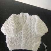 Cable and bobble patterned aran style baby cardigan using Sirdar 'My Little Cherub' pattern book 226 - craftybabscreativecrafts.co.uk