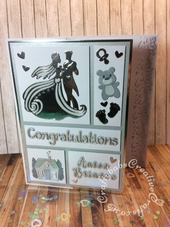 3 cards in 1 Wedding, New home, Expecting a new baby. Made using various dies including; Unbranded bride and groom die, Crafti Potential Congratulations sentiment dies, Sizzix Thinlits Die Set 17PK 664579 Bell Jar Diorama by Jen Long, Sizzix, Marianne Eline's Baby Animals die set, Marianne Design MLR0305 Feet Craftables Die, Cuttlebug baby elements die and Crafters companion Gemini Expressions Metal Die – Uppercase and lower case Alphabet Sets. - craftybabscreativecrafts.co.uk