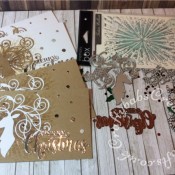Batch make Christmas cards made using various dies including Tattered Lace Tuck In Circles (ETL170), Sue Wilson Mini Expressions Stacked Merry Christmas Craft Die, Sizzix Elegant Deer die, Memory Box stencil Texture brilliant with Distress ink and Cosmic shimmer Glitter kiss. - craftybabscreativecrafts.co.uk