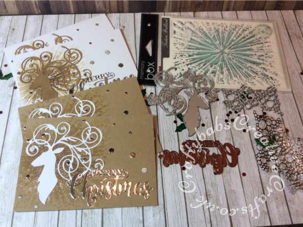 Batch make Christmas cards made using various dies including Tattered Lace Tuck In Circles (ETL170), Sue Wilson Mini Expressions Stacked Merry Christmas Craft Die, Sizzix Elegant Deer die, Memory Box stencil Texture brilliant with Distress ink and Cosmic shimmer Glitter kiss. - craftybabscreativecrafts.co.uk