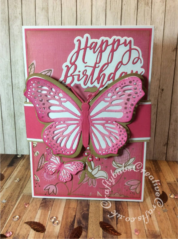 Interlock double concertina card inspired by Sam Calcott. Made using various dies including Bright Rosa Butterfly band and butterfly border dies, Bright Rosa flower dies, Sue Wilson Finishing Touches Spring Foliage Dies, Paper Boutiques relatives and sentiment dies and Card Making Magic Happy birthday sentiment dies. - craftybabscreativecrafts.co.uk