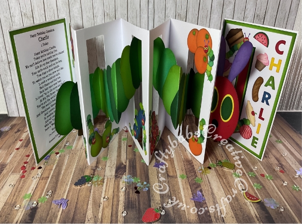 First Birthday card themed on The Very Hungry Caterpillar story using way too many dies to list. A labour of love created using a home made card design and numerous dies to create various elements of the card. - craftybabscreativecrafts.co.uk