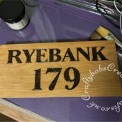 Wood burned House name and number plaque made using pyrography iron, barbeque smoking plank and a printed template for the lettering. - craftybabscreativecrafts.co.uk