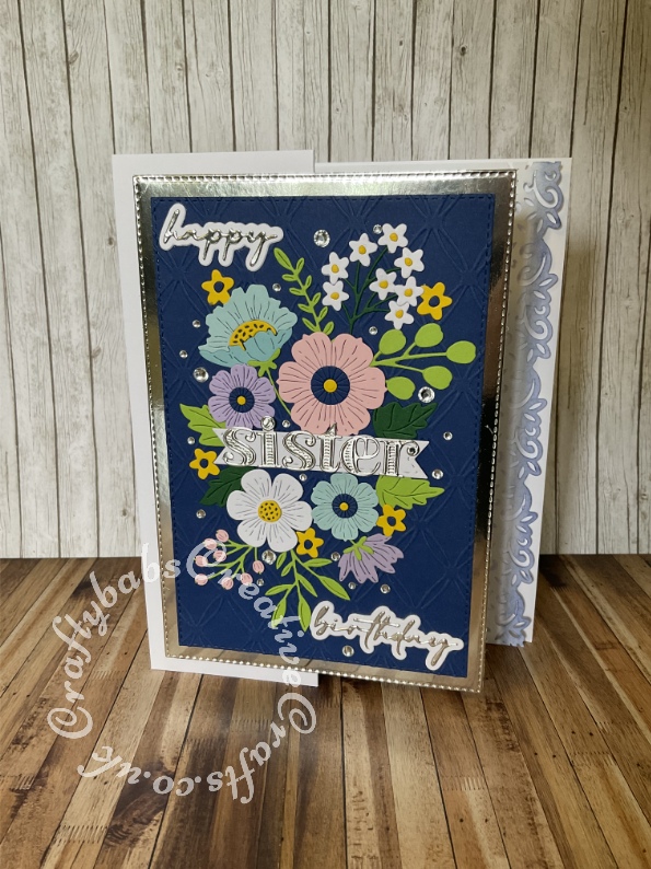 Floral birthday card made using various dies including; Spellbinders large die of the month January 2023, unbranded alphabet and script sentiment dies, Apple Blossom stitched banner die, Unbranded stitched rectangle dies, Tattered lace embossing folder. - craftybabscreativecrafts.co.uk