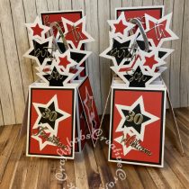 Pop Up Box birthday cards made for twins Using various dies including: Spellbinders nested star dies, Sizzix thinlits Happy Birthday sentiment dies, Sizzix Fabulous Family Names Thinlits Die Set 13pc by Debi Potter, Sizzix thinlits Fabulous Birthday Numbers by Debi Potter, and Creative Expressions Dies Phill Martin Scribbled Collection alphabet dies. - craftybabscreativecrafts.co.uk