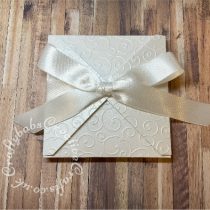Baby Boy Christening keepsake made using a variety of dies including Tattered Lace Essentials nesting Notched squares dies, Marianne D® Creatables Die Set 2pk - Cameo Silhouette,designs Creatables, Marianne collectables baby feet dies, Crafters Companion Gemini layered alphabet dies, Quickutz nesting Tag dies, Ellison thick cutz envelope die, Spellbinders nesting plain & scalloped oval dies, Parchment pocket made using an envelope template stencil, Cross and baby words embossed using brass stencils, outer cover embossed using couture creations intrinsic embossing folder. -craftybabscreativecrafts.co.uk